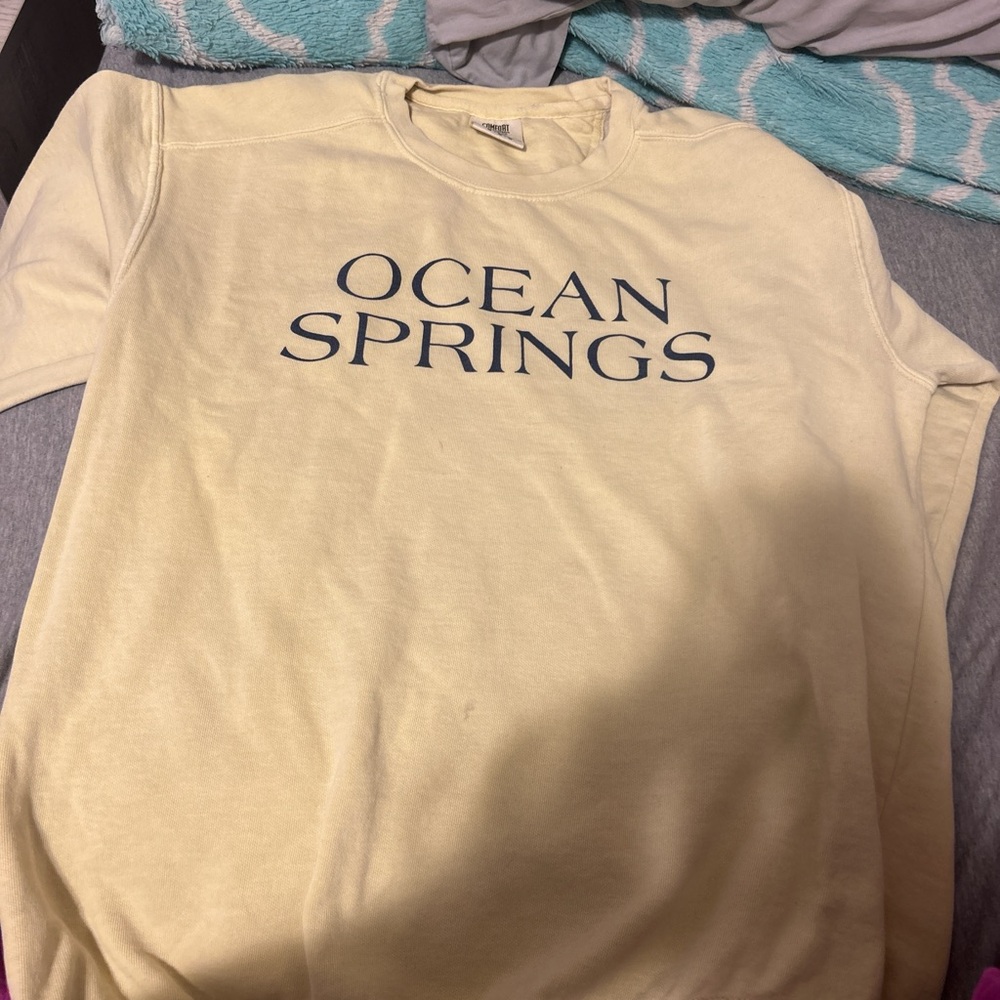 yellow sweatshirt